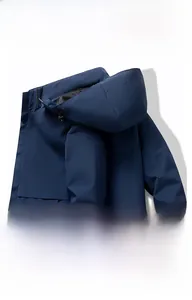 Waterproof navy hooded jacket showing breathable membrane detail and brand logo