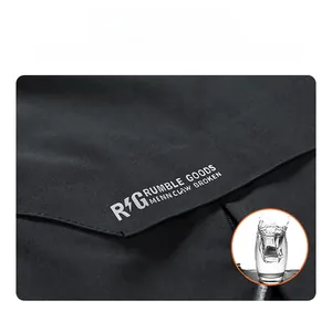 Detail of waterproof matte fabric on black men's casual jacket with windproof texture