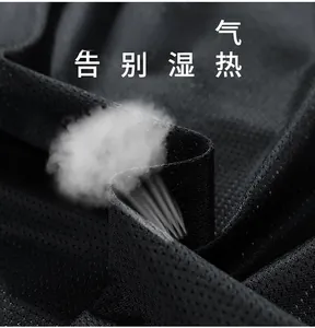 Detail of black breathable mesh fabric showing tight texture and ventilation holes