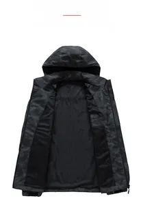 Detail of camouflage outdoor jacket with breathable black mesh lining and velcro cuffs
