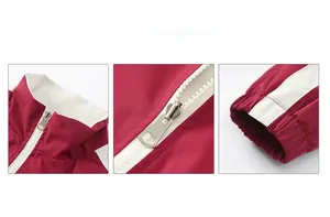 Détail de la veste bordeaux avec col montant, fermeture éclair et poignets élastiques