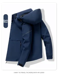 Detail of navy blue hooded jacket featuring adjustable velcro cuffs and a side zipper pocket