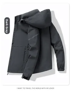 Detail of dark grey hooded jacket sleeve featuring sport series print and velcro cuff