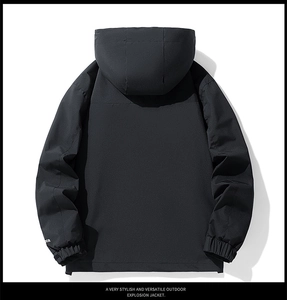Detail view of the outdoor jacket showing elastic cuffs and windproof fabric texture