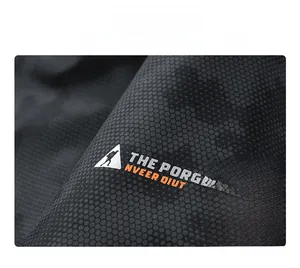 Macro detail of high-performance hexagonal weave fabric with professional 3-layer protection