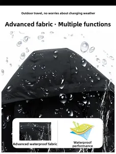 Close-up of waterproof fabric technology showing water droplets on black jacket surface