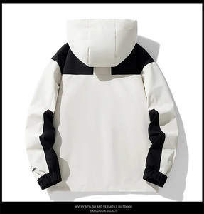 Rear view of black and white color-block outdoor jacket with hooded waterproof design