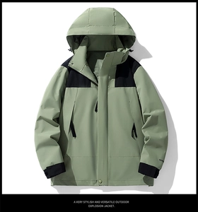 Flat lay of outdoor jacket showing contrast panels on shoulders and adjustable hood