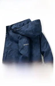 Detail showing waterproof navy camouflage fabric and layered perspiration technology