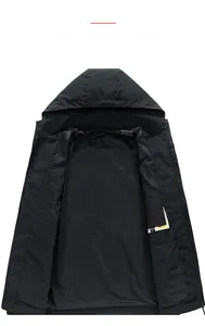 Detail view of black jacket interior featuring breathable mesh lining and inner pocket