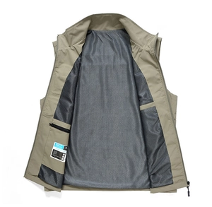 Detail of outdoor fishing vest showing mesh lining and internal zipper security pocket