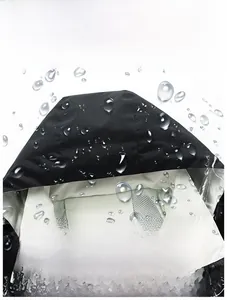 Detailed macro view showing the waterproof tech fabric and breathable mesh lining of the jacket
