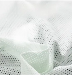 Detailed macro view of white breathable mesh lining for outdoor waterproof jackets