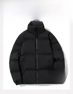 Close-up of premium down alternative cotton filling in a black men's winter puffer jacket