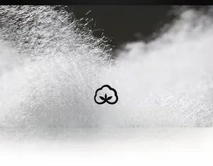 Macro shot of fluffy white fiber insulation showing thick thermal padding detail