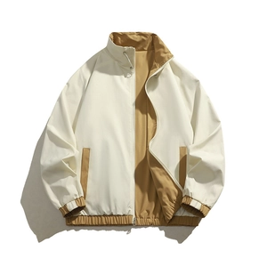 Unisex off-white and khaki reversible windbreaker jacket with stand collar and adjustable cords