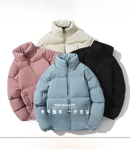 Detail of four-color winter puffer jackets featuring stand collar and windproof cuffs