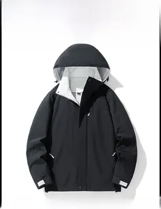Detail of outdoor windproof hooded jacket with white contrast lining and velcro cuffs