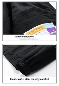 Detail of black sports jacket featuring breathable mesh lining and a hidden inner pocket