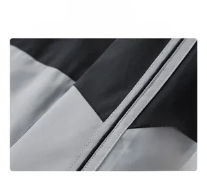 Detail showing the wear-resistant and anti-scratch fabric of the outdoor jacket