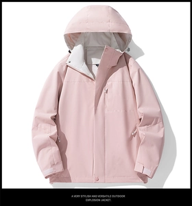 Detail view of pink outdoor jacket featuring breathable white mesh lining and velcro cuffs