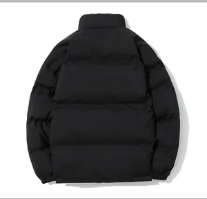 Back view of black stand-collar quilted puffer jacket with windproof fabric and elastic cuffs