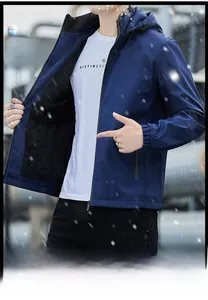 Detail of navy blue hooded jacket featuring warm black fleece lining and ribbed cuffs