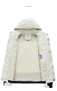 Detail of outdoor jacket showing breathable white mesh lining and interior pocket