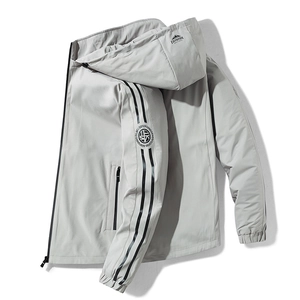Men's light grey hooded windbreaker jacket with black triple stripe design on sleeves