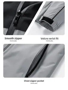 Detail view of waterproof chest pocket and adjustable velcro cuffs on outdoor jacket