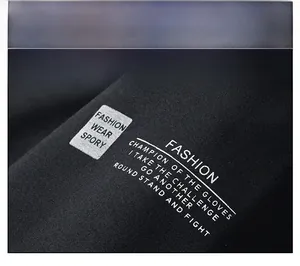 Detail of the black fleece jacket sleeve featuring white fashion typography printing