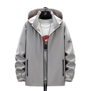 Men's light grey hooded windbreaker jacket with zipper pockets and casual relaxed fit