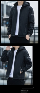 Detail of men's black windbreaker featuring hooded drawstring and zip pockets