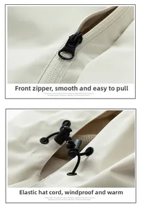 Macro detail of waterproof front zipper and adjustable drawstring on beige outdoor jacket