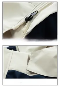 Detail of detachable hood on waterproof jacket featuring smooth zipper and snap buttons