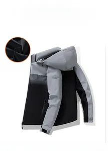 Detail of grey outdoor jacket featuring mesh breathable inner and Velcro sleeve cuffs