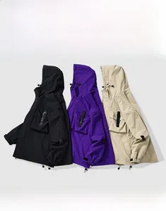 Detailed close-up showing black, purple and khaki outdoor jackets with multiple pockets