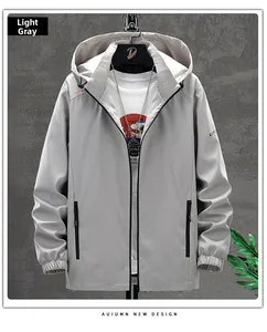 Detail of light gray hooded windbreaker with zip closure and elasticated cuffs for men