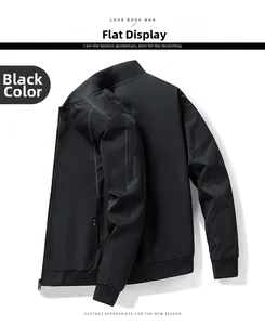 Detail of black bomber jacket sleeve featuring MENIN CLAW print and ribbed cuffs