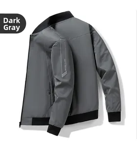 Detail view of dark grey casual jacket showing ribbed stand collar and white arm lettering