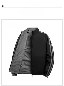 Détails d'une veste réversible noire pour homme avec col montant et bandes grises aux manches