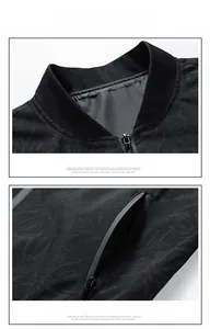 Detail view of black men's jacket with ribbed baseball collar and zippered pocket design