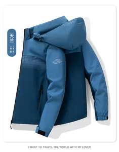 Detail of blue outdoor hooded jacket with drawstring hood and velcro cuffs on white background