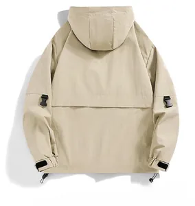 Rear view detail of khaki mountain jacket showing hood and windproof fabric texture