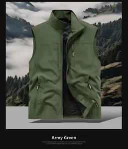 Detail of army green utility vest showing breathable black mesh lining and zip pockets