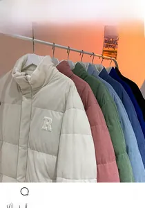 Detail of corduroy quilted winter jacket texture with variety of available color options