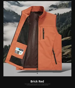 Detail of red outdoor vest showing breathable black mesh lining and inner pocket