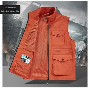 Detail of the brick red fishing vest showing multi-pockets and breathable mesh lining