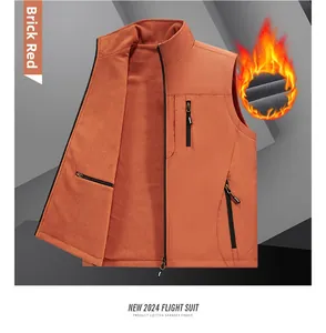 Detail view of brick red outdoor vest with thickened grey fleece lining for warmth
