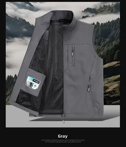 Detail of gray fishing vest showing breathable black mesh lining and zip pockets